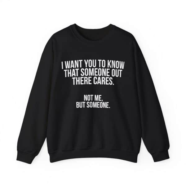 Black sweatshirt with funny statement print about caring and being unnoticed.