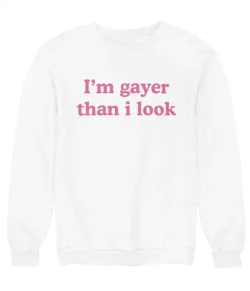 Gamer-inspired statement sweatshirt with humorous pink text on a casual white background.