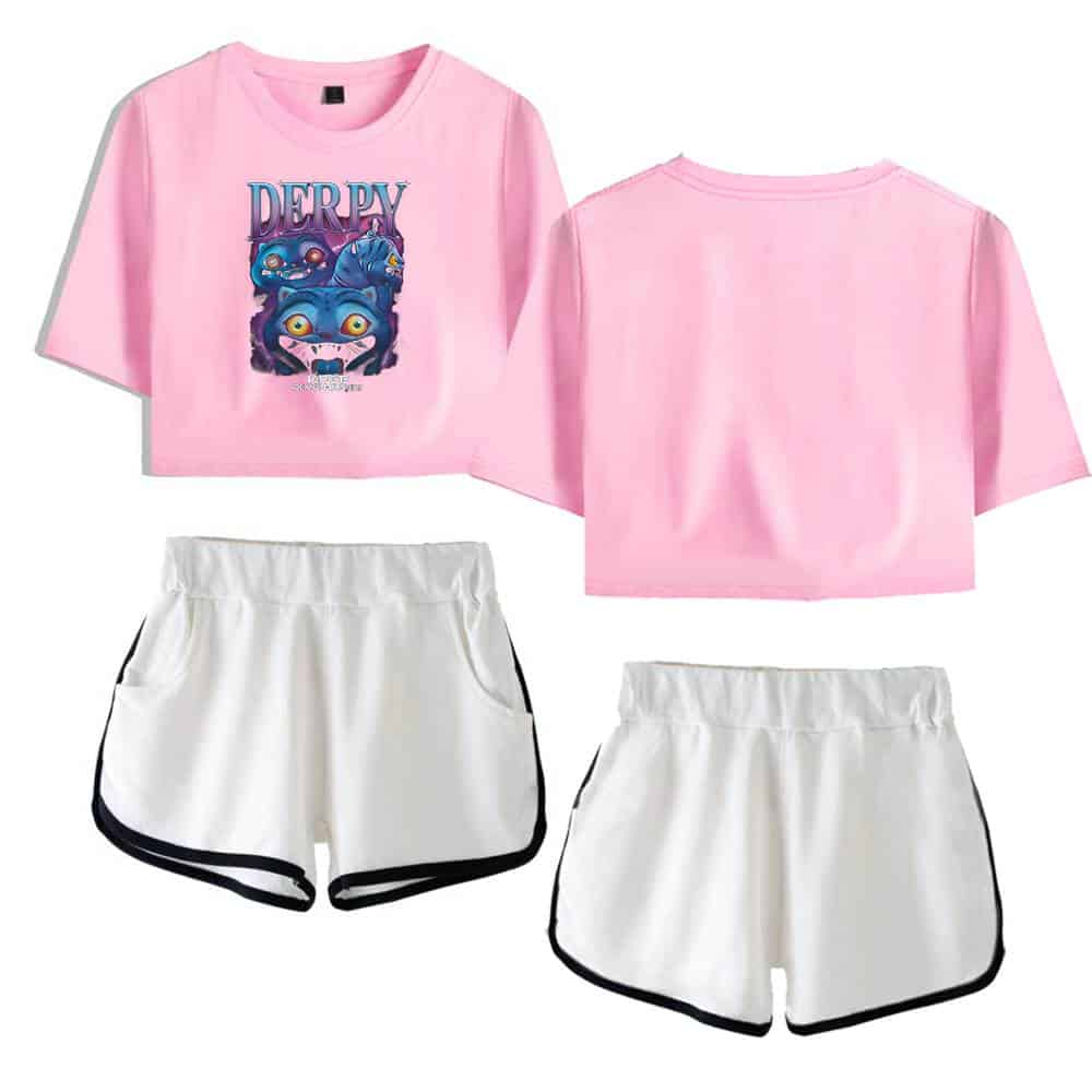 Bright pink cropped t-shirt featuring a colorful playful design of cartoonish cats and the word "DERPY" in bold letters. The t-shirt pairs with white athletic shorts with black trim for a casual, stylish look.