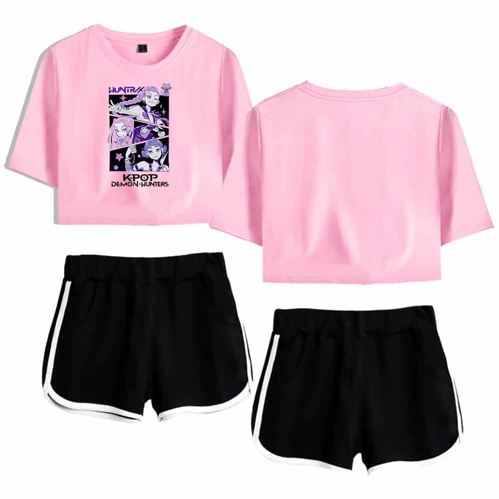 Comfy pink graphic crop top and black athletic shorts with white trim, casual streetwear style for trendy, affordable fashion enthusiasts.
