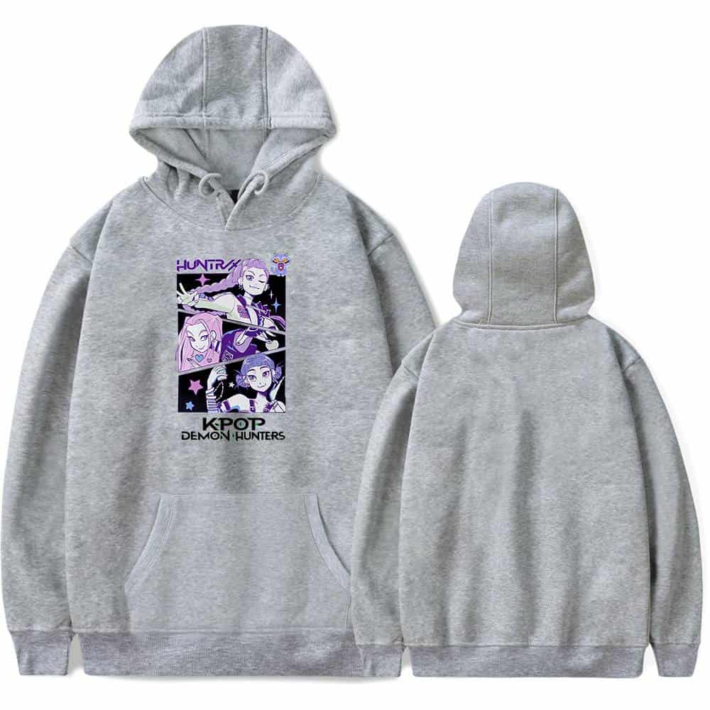 Hooded sweatshirt featuring a colorful anime-inspired graphic of K-pop Demon Hunters characters on a light gray fabric. Casual, stylish, and budget-friendly streetwear for fans of anime and K-pop culture.