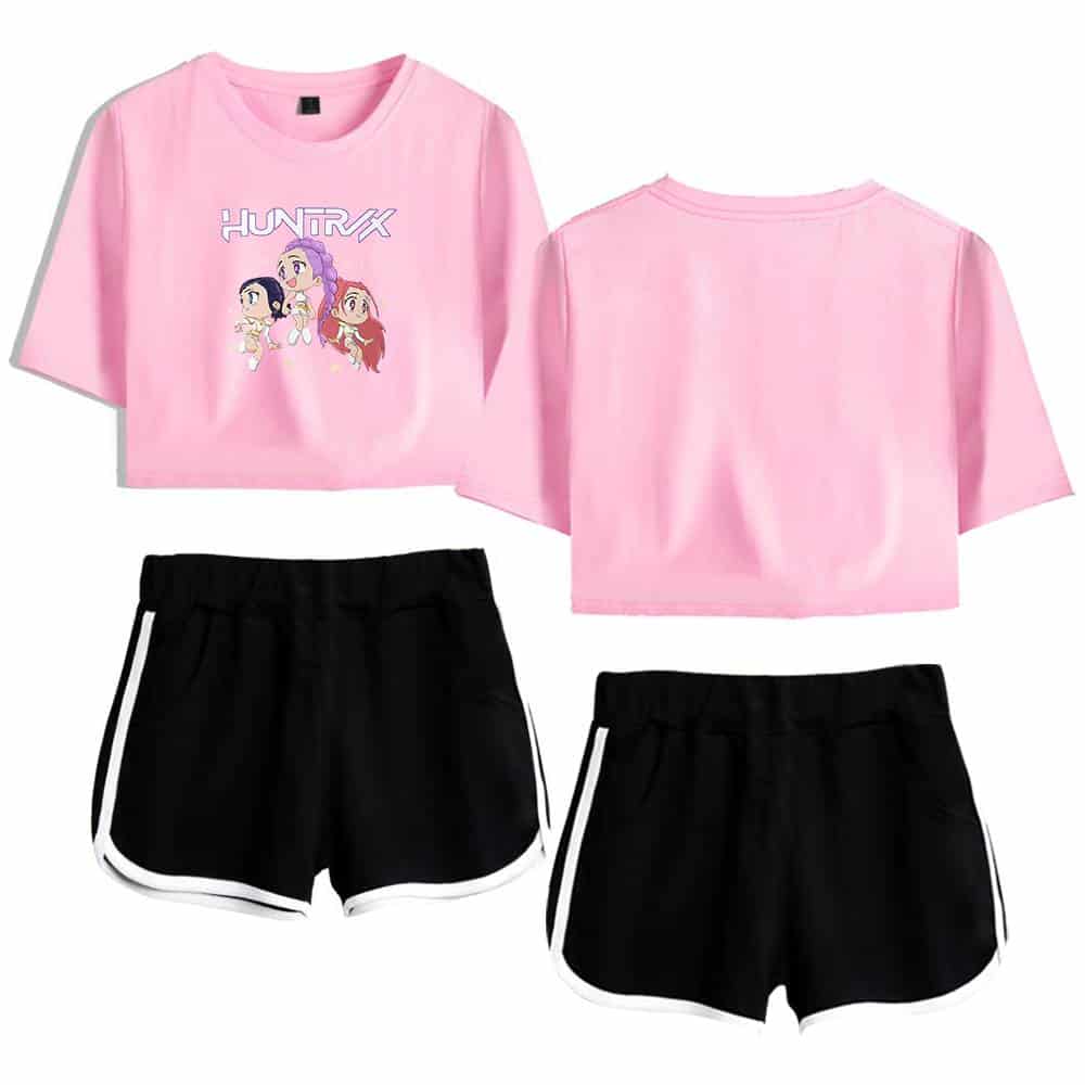 Girl's pink "HUNTRX" graphic crop top and black athletic shorts with white trim, casual and trendy youth sportswear for a cool, affordable style.